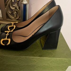 Elegant Black Leather Women's Shoes with Gold Detail